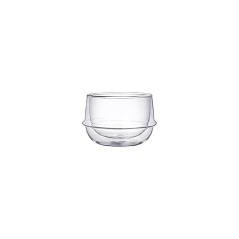 A clear double-walled glass cup with a round base and a slightly flared rim. The Kinto Double-Walled Teacups, perfect for enjoying Magic Hour Tea, appear sleek and modern against a plain white background.