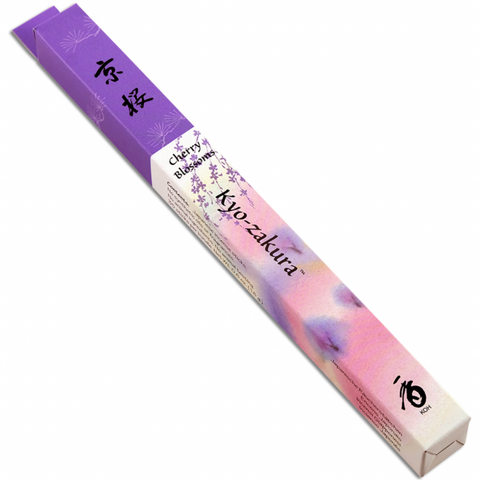 A box of Kyoto Cherry Blossoms incense sticks, featuring a purple and pink floral design. The packaging is adorned with black Japanese characters and English text, transitioning from purple to pink with white accents. Infuse your space with the refreshing spring fragrance of sakura cherry blossoms.