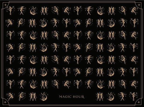 A black poster features rows of various geometric, celestial, and humanoid shapes in a gold illustration style, with a symmetrical pattern. At the bottom center, the words "TEA CEREMONY TOWELS" are displayed prominently in gold lettering, evoking the enchanting allure of Magic Hour.