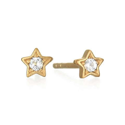 **Product Description:** The Star Stud Earrings are a pair of gold, star-shaped studs, each adorned with a small, clear gemstone at the center. These earrings embody individuality through their elegant yet simple design and polished finish, perfectly complementing any outfit with a creative flair.